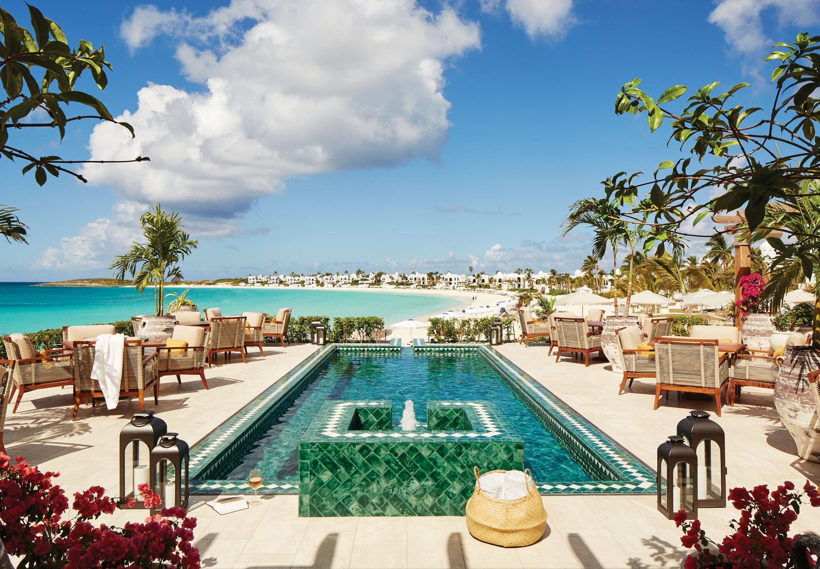 Isadinha at Belmond Cap Juluca with a craft drink, Caribbean sea view